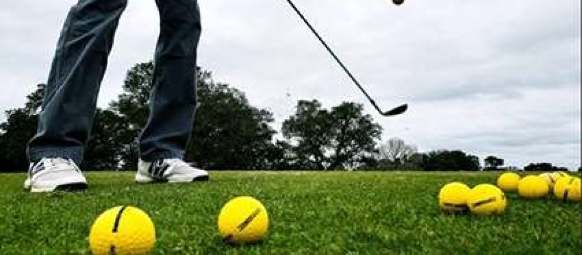 Junior-golfer-hitting-range-balls-copy